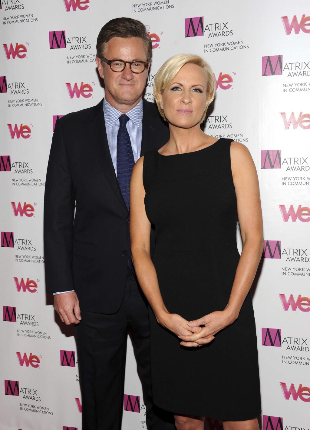 FILE - In this Monday April 22, 2013, file photo, MSNBC's 'Morning Joe' co-hosts Joe Scarborough and Mika Brzezinski, right, attend the 2013 Matrix New York Women in Communications Awards at the Waldorf-Astoria Hotel in New York. MSNBC confirmed Thursday, May 4, 2017, that the “Morning Joe” co-hosts are engaged. (Photo by Evan Agostini/Invision/AP, File)