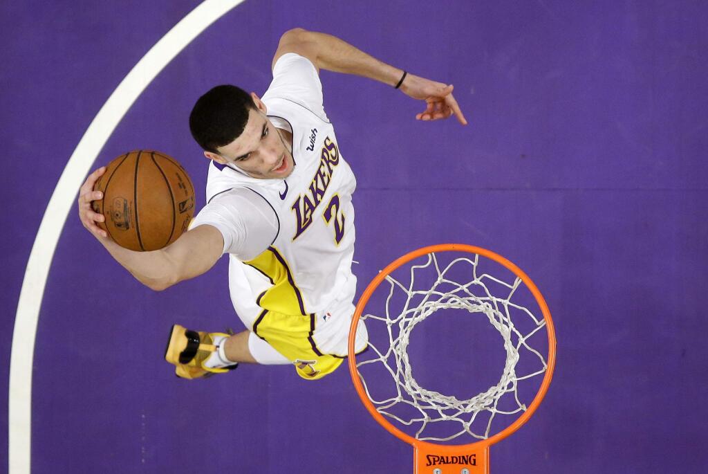 Los Angeles Lakers guard Lonzo Ball goes up for a dunk during the second half of a basketball game against the Atlanta Hawks, Sunday, Jan. 7, 2018, in Los Angeles. The Lakers won 132-113. (AP Photo/Mark J. Terrill)