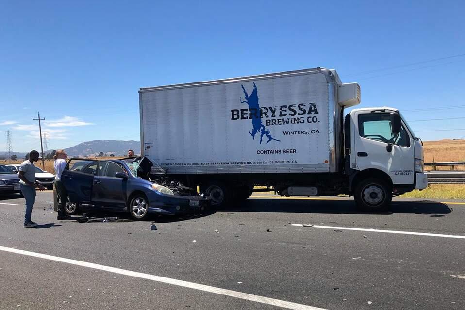 Scene of a collision on Highway 37 on Tuesday afternoon, July 17, when a delivery truck ran over the front end of a Toyota hatchback. The driver of the Toyota was airlifted to a Napa hospital with major injuries. (Rachel Hundley/FACEBOOK)