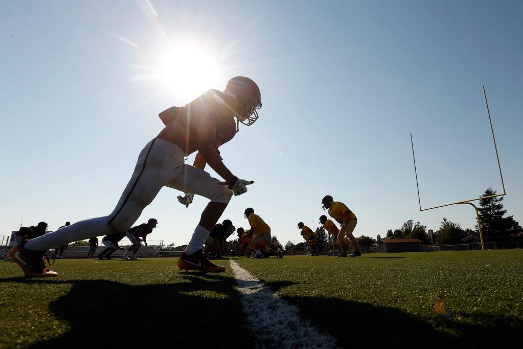 Piner Prospectors wide reciever Angelo Giannavola takes off on his passing route during football practice at Piner High School in Santa Rosa, California on Tuesday, August 16, 2016. (Alvin Jornada / The Press Democrat)