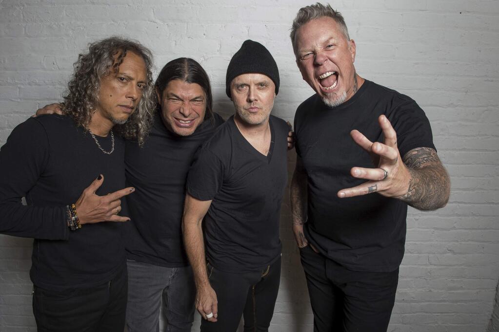 In this Sept. 22, 2016 photo, Metallica band members, from left, Kirk Hammett, Robert Trujillo, Lars Ulrich and James Hetfield pose for a portrait in New York to promote their first album in eight years, 'Hardwired… To Self-Destruct.' (Photo by Charles Sykes/Invision/AP)