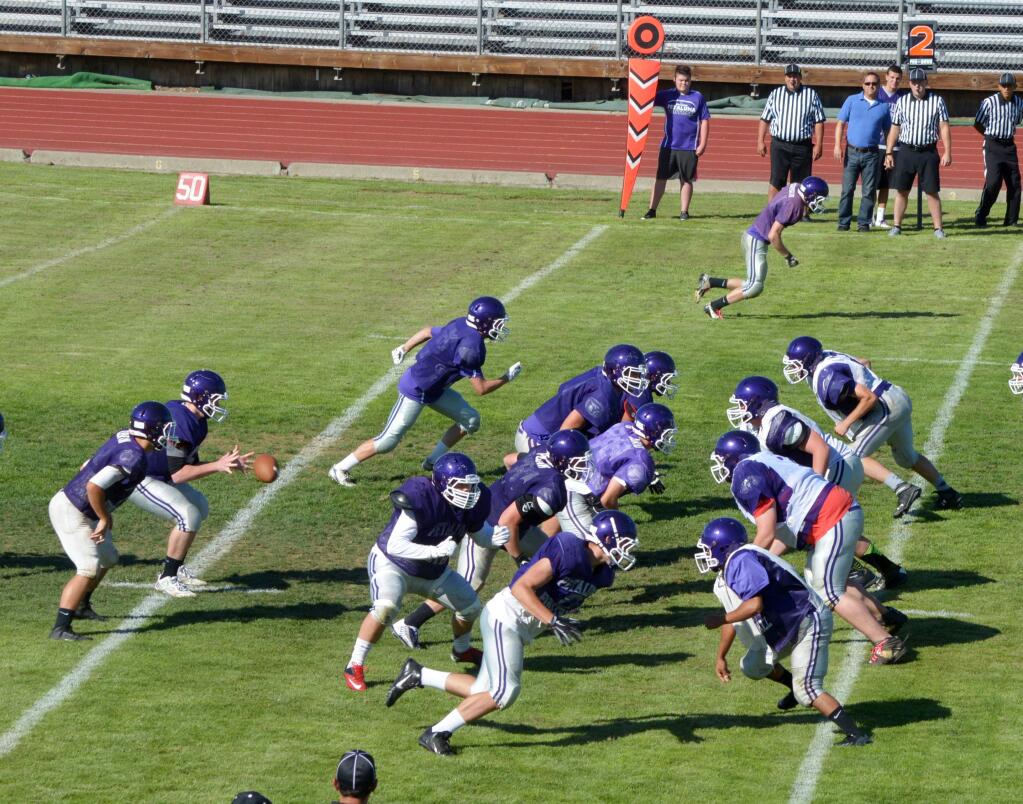 SUMNER FOWLER/FOR THE ARGUS=COURIERIt was Trojans vs. Trojans in an inter-squad scrimmage last week. Petaluma coach Rick Krist was especially pleased with the play of the young Trojan junior varsity players.