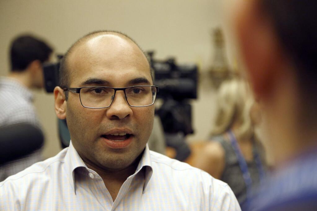 Los Angeles Dodgers general manager Farhan Zaidi talks with the media during baseball's annual general managers meeting Wednesday, Nov. 9, 2016, in Scottsdale, Ariz. (AP Photo/Ross D. Franklin)