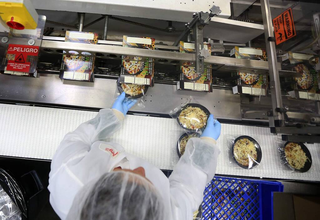 Meals are packaged for shipping at Amy's Kitchen in Santa Rosa in this 2013 file photo. (Kent Porter/ The Press Democrat, 2013)