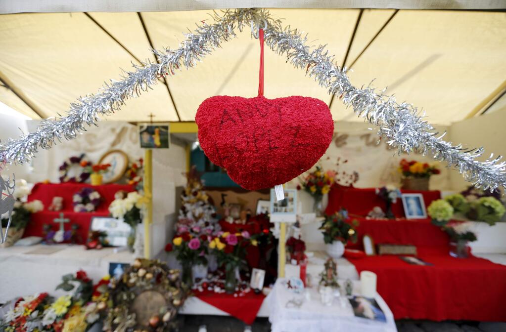 A stuffed heart with Andy Lopez written on it hangs at a memorial where the future site of Andy's Unity Park will be located in Santa Rosa, on Monday, December 19, 2016. (BETH SCHLANKER/ The Press Democrat)