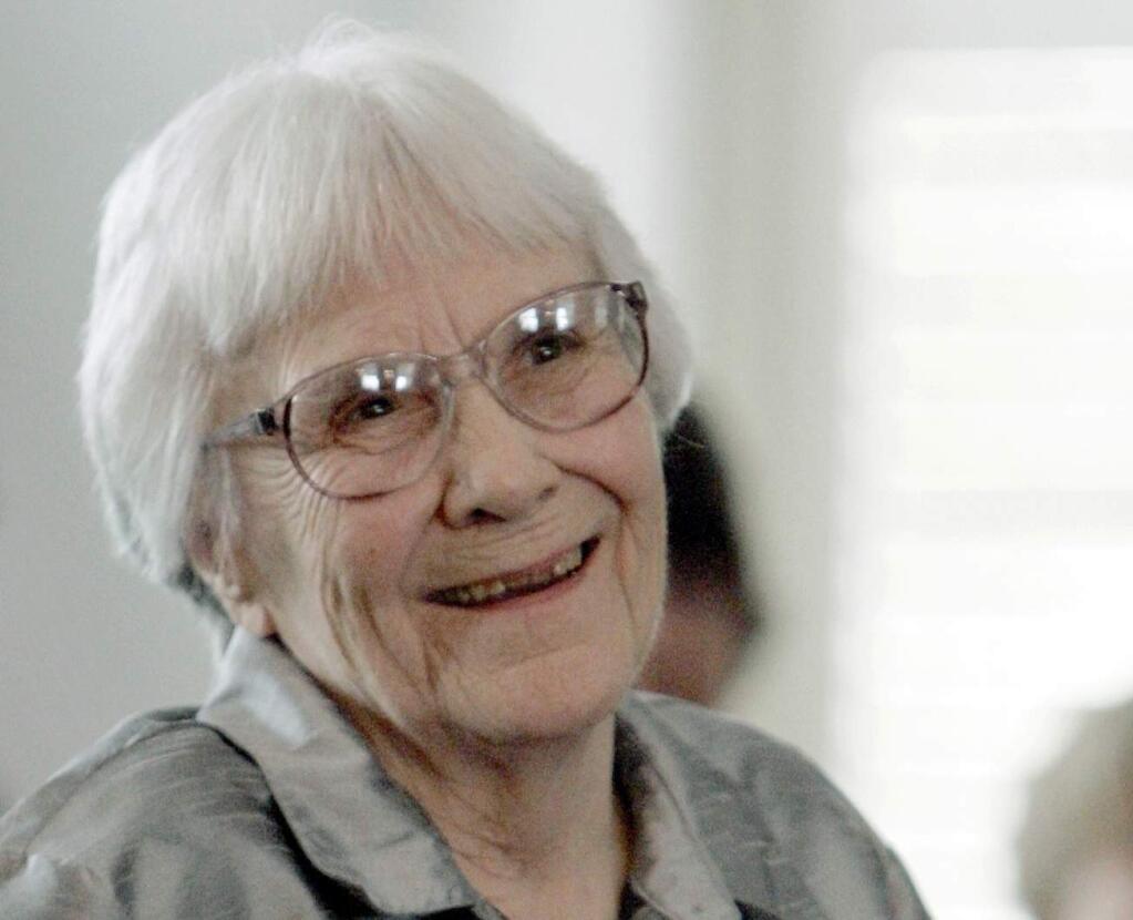 FILE - In this Aug. 20, 2007, file photo, author Harper Lee smiles during a ceremony honoring the four new members of the Alabama Academy of Honor at the Capitol in Montgomery, Ala. A batch of letters hand written by 'To Kill a Mockingbird' author Harper Lee has sold for more than $12,000. A statement from the Los Angeles-based Nate D. Sanders Auctions says 38 letters from the deceased novelist to friend Felic Itzkoff went for $12,500 in a sale held Thursday, Oct. 26, 2017. (AP Photo/Rob Carr, File)