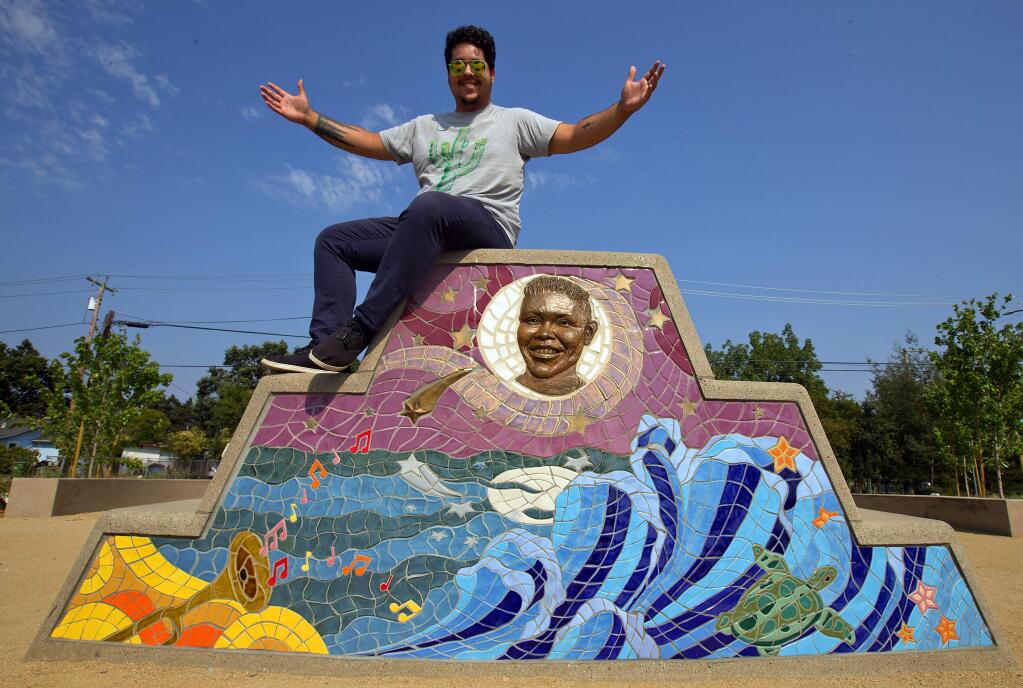Herbert Martinez and other students worked with teacher Peter Schifrin of The Academy of Art University to create a monument to Andy Lopez with 975 handmade tiles and 15 bronze elements at Andy's Unity Park in Santa Rosa. (JOHN BURGESS/ PD)