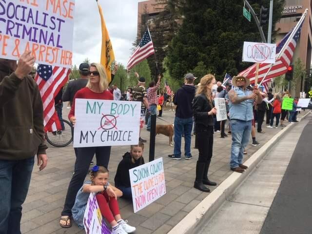 People protest the shelter-at-home order at Old Courthouse Square in Santa Rosa on Saturday, May 2, 2020. (Chris Smith/The Press Democrat)