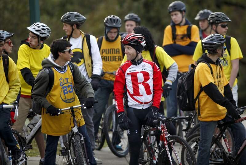 Professional cyclist Levi Leipheimer talks with members of The Caravaners, a cycling club, from Maria Carrillo High School before riding with them in a GranFondo(Photo by Beth Schlanker)