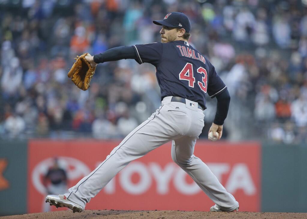 Cleveland Indians starting pitcher Josh Tomlin works in the first inning of the team's baseball game against the San Francisco Giants on Monday, July 17, 2017, in San Francisco. (AP Photo/Eric Risberg)