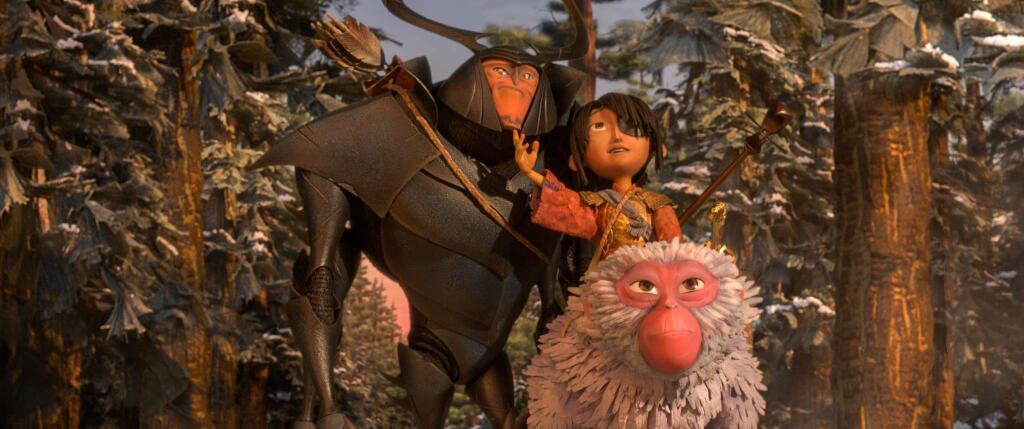 This image released by Focus Features shows characters Beetle, voiced by Matthew McConnaghey, Kubo, voiced by Art Parkinson and Monkey, voiced by Charlize Theron in a scene from the animated film, 'Kubo and the Two Strings.' (Laika Studios/Focus Features via AP)