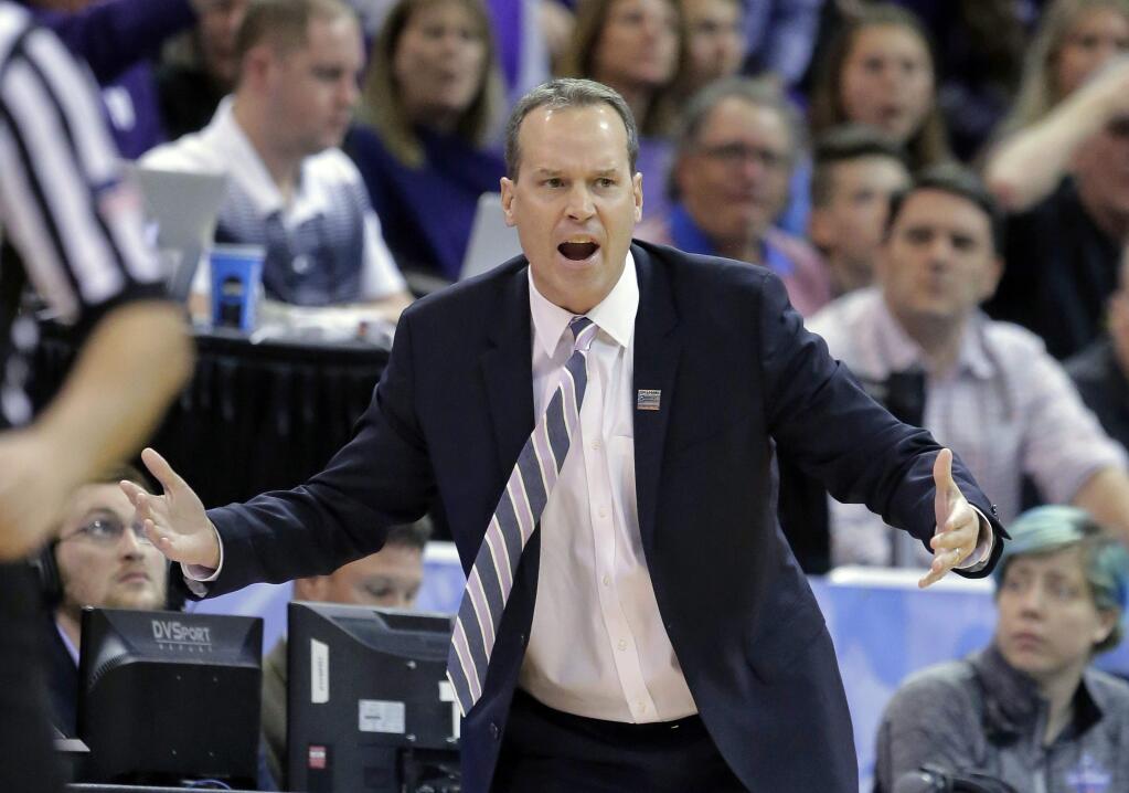 Northwestern head coach Chris Collins shouts to his team during the first half of a first-round men's college basketball game in the NCAA Tournament against Vanderbilt, Thursday, March 16, 2017, in Salt Lake City. (AP Photo/Rick Bowmer)