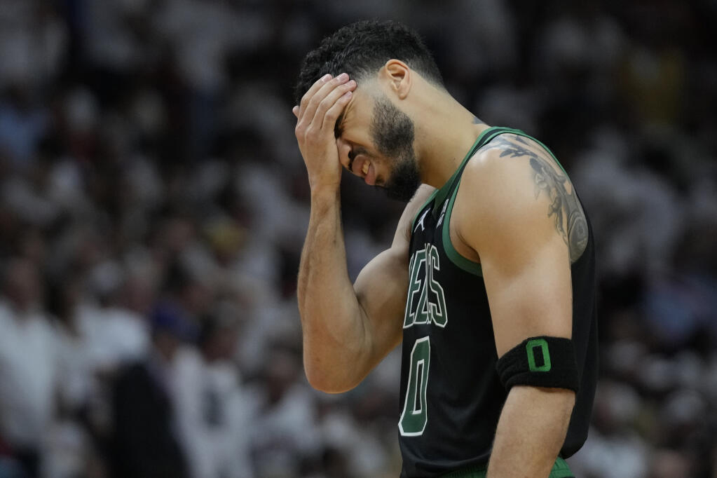 Boston Celtics forward Jayson Tatum reacts during the second half of Sunday’s Game 3 of the NBA Eastern Conference finals against the Heat in Miami. (Wilfredo Lee / ASSOCIATED PRESS)