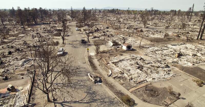Hundreds of homes were destroyed in the Coffey Park area of Santa Rosa as containment grows, the residents are beginning to clean up and put their lives back together. (Chad Surmick/The Press Democrat)