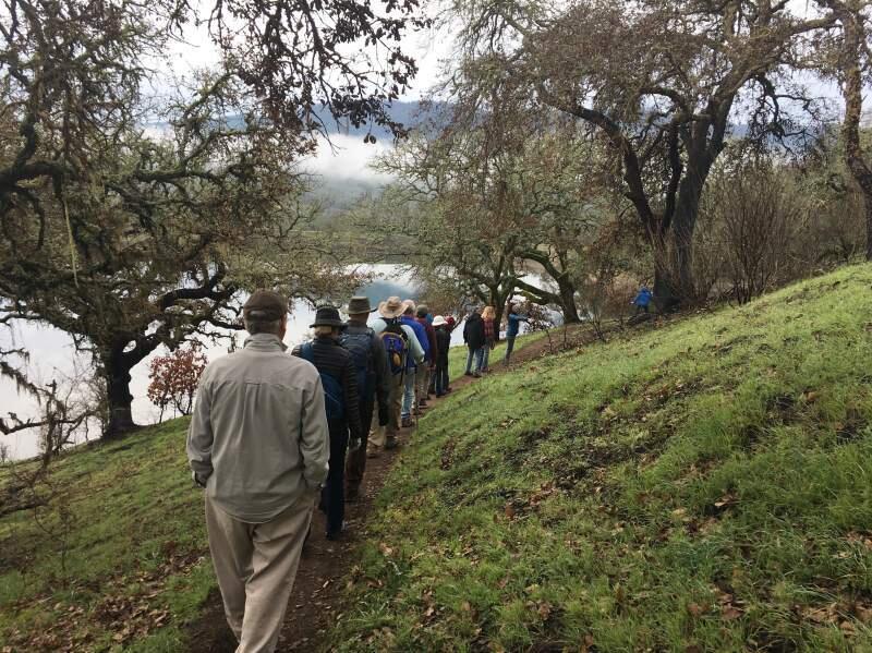 Participants of a Sonoma Ecology Center hike through SDC circumnavigate one of the Eldridge property's two lakes -- which some say would make splendid family fishing holes.