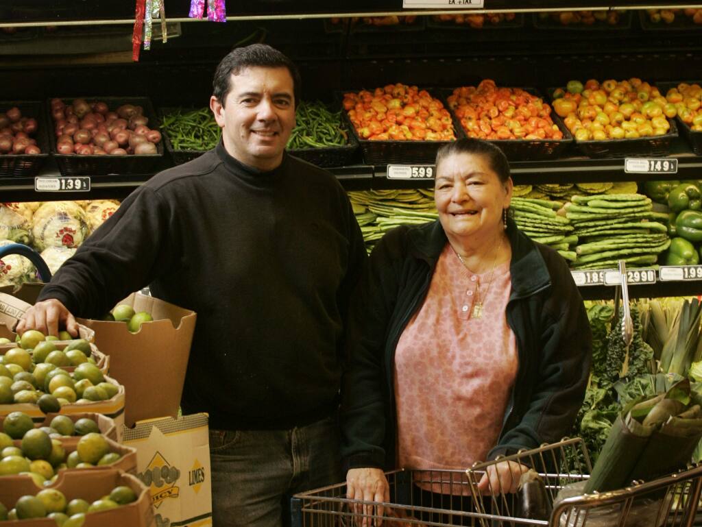 Lola's owner David Ortega and his mother Delores, for whom the supermarket is named, stand in the Petaluma Hill Road location. Shot on Friday, February 1, 2008 for Santa Rosa magazine. ( Press Democrat / Charlie Gesell )