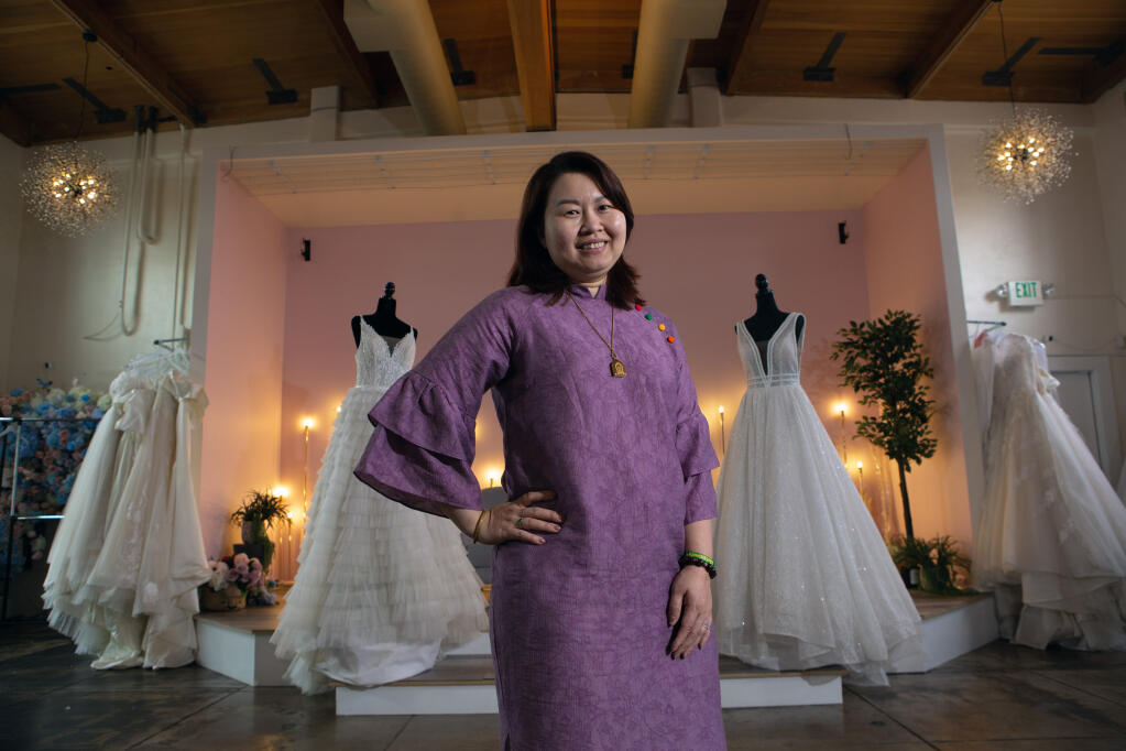 Hien Le, proprietor of Dare and Dazzle, a shop on West Napa Street that both rents and sells affordable yet beautifully designed wedding dresses and accessories. Photo taken on Feb. 16, 2024. (Robbi Pengelly/Index-Tribune)