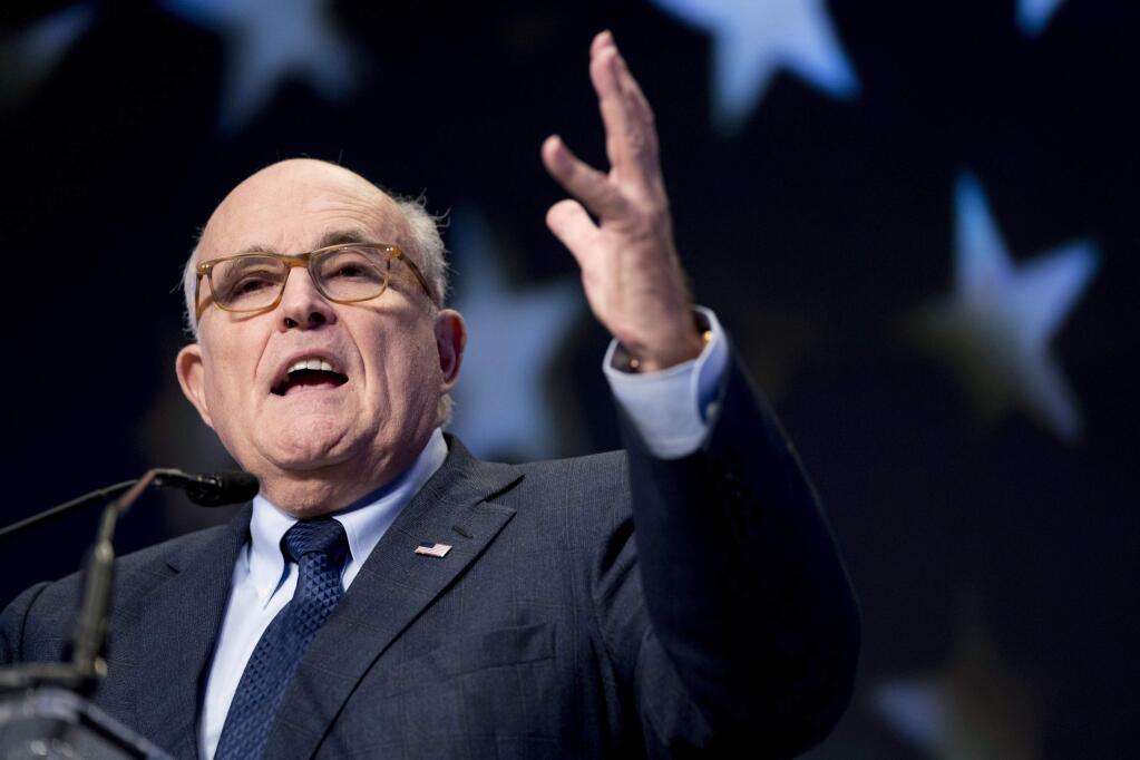 FILE - In this May 5, 2018, file photo, Rudy Giuliani, an attorney for President Donald Trump, speaks at the Iran Freedom Convention for Human Rights and democracy in Washington. Giuliani is categorically ruling out the possibility of a presidential interview with special counsel Robert Mueller. Giuliani told “Fox News Sunday” that an interview would happen “over my dead body.” (AP Photo/Andrew Harnik, File)