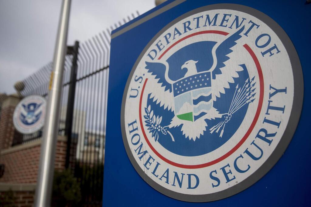 The Department of Homeland Security seal is shown at the agency's headquarters in Washington. (ANDREW HARRER / BLOOMBERG NEWS)