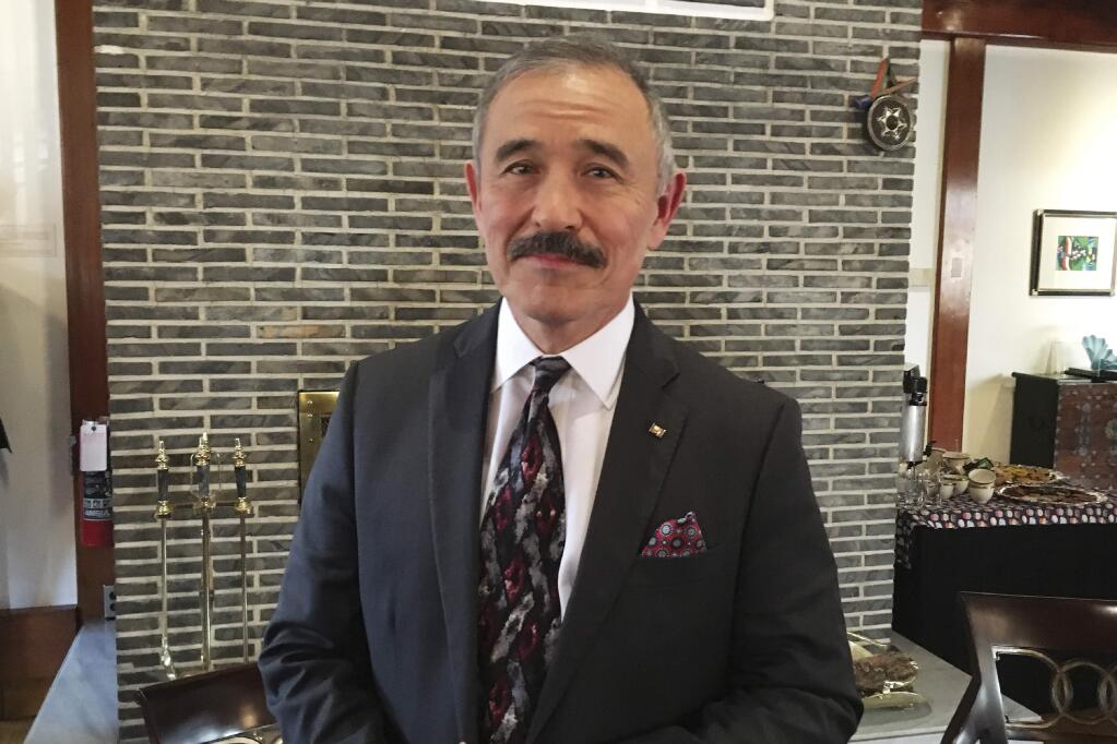 In this Thursday, Jan. 16, 2020, photo, U.S. Ambassador to South Korea Harry Harris poses after a briefing with a group of foreign reporters at his residence in Seoul, South Korea. Harris has some unusual explanations for the harsh criticism he's faced in his host country. His mustache, maybe? Or a Japanese ancestry that raises unpleasant reminders of Japan's former colonial domination of Korea? (AP Photo/Hyung-Jin Kim)