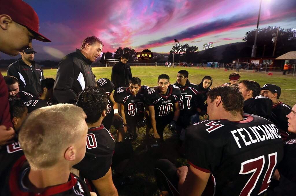 PRESS DEMOCRAT PHOTOTomales High School coach Leon Feliciano talks to his 14- man football team after the Braves beat Hoopa Valley, 41-12, in 2014. Feliciano will be inducted into the Marin County Athletic Hall of Fame on Nov. 5.