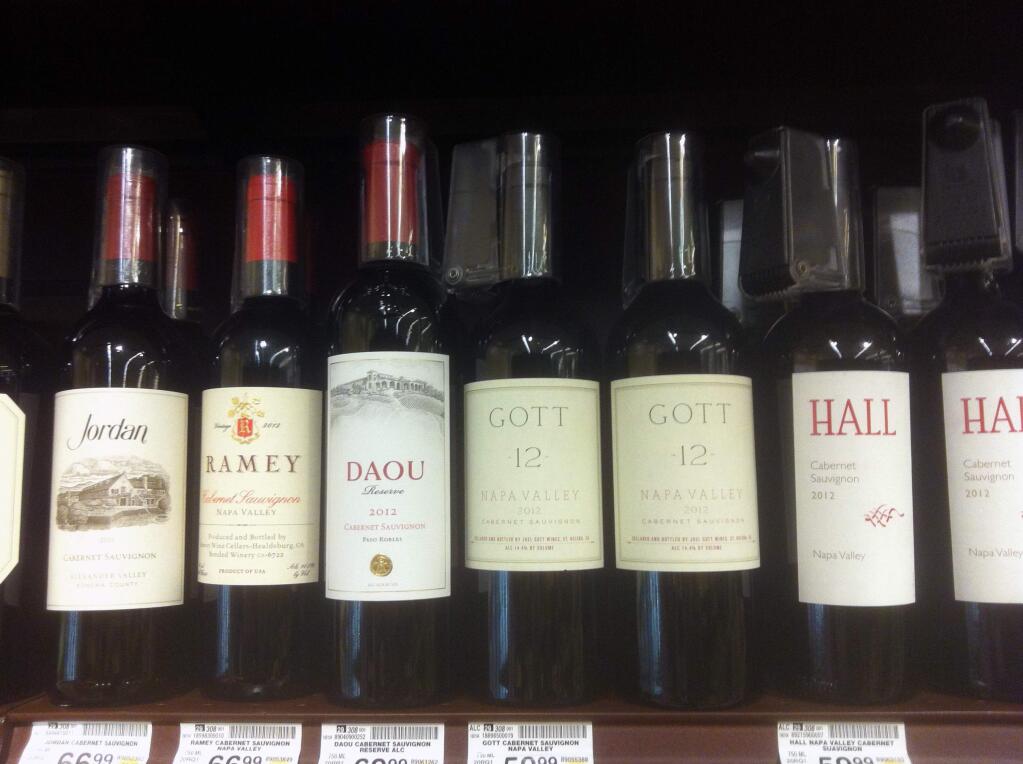TOP SHELF wines at Safeway have proven attractive to shoplifters, who find a ready black market for Napa and Sonoma red wine. (Christian Kallen/Index-Tribune)