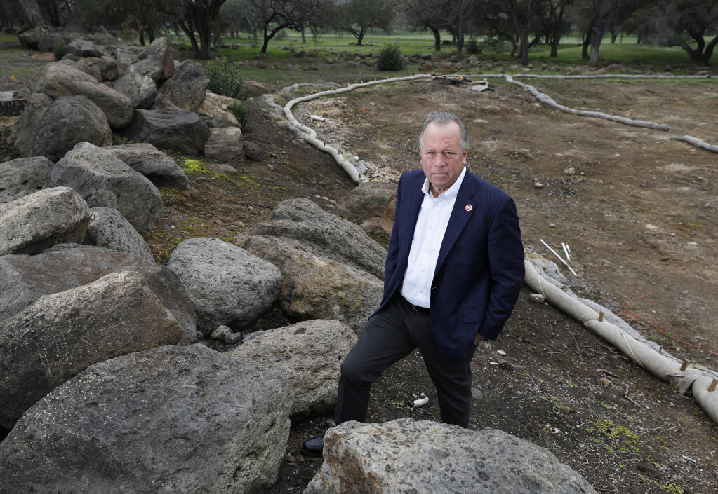 California State Sen. Bill Dodd, D-Napa, representing the 3rd Senate District, stands near the site of condominiums that burned on Tamarack Drive during the Atlas fire in 2017. Photo taken in Napa on Wednesday, January 30, 2019. (BETH SCHLANKER/THE PRESS DEMOCRAT)