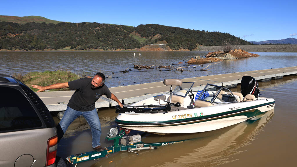 Sonoma County resident Carl Bowers trailers his boat, Tuesday, Jan. 17, 2023 at Lake Sonoma, as the lake level continues to rise following historic drought conditions. (Kent Porter / The Press Democrat file)