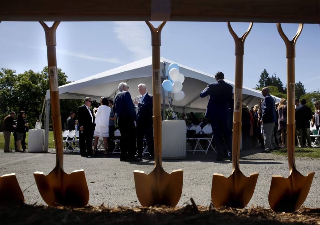 Officials mingle during the groundbreaking of the new Wine Spectator Learning Center on the Sonoma State University campus in Rohnert Park on Wednesday, June 1, 2016. (BETH SCHLANKER/ The Press Democrat)