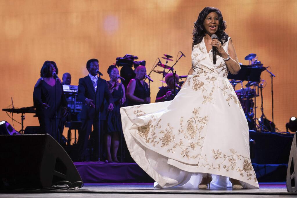 FILE- In this April 19, 2017 file photo, Aretha Franklin performs at the world premiere of 'Clive Davis: The Soundtrack of Our Lives' at Radio City Music Hall, during the 2017 Tribeca Film Festival, in New York. Franklin is seriously ill, according to a person close to the singer. The person, who spoke on the condition of anonymity because the person was not allowed to publicly talk about the topic, told The Associated Press on Monday, Aug. 13, 2018, that Franklin is seriously ill. No more details were provided. (Photo by Charles Sykes/Invision/AP, File)