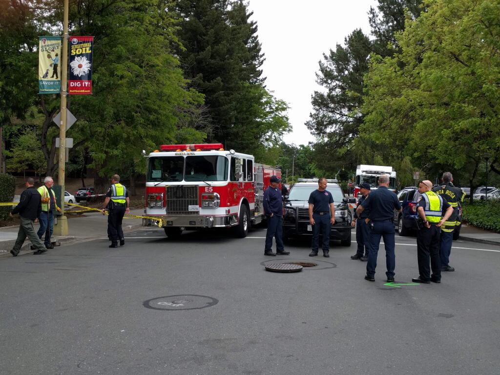 Police were investigating after a body was discovered in a storm drain near the intersection of First and D streets in Santa Rosa on Monday, May 14, 2018. (CHRISTOPHER CHUNG/ PD)