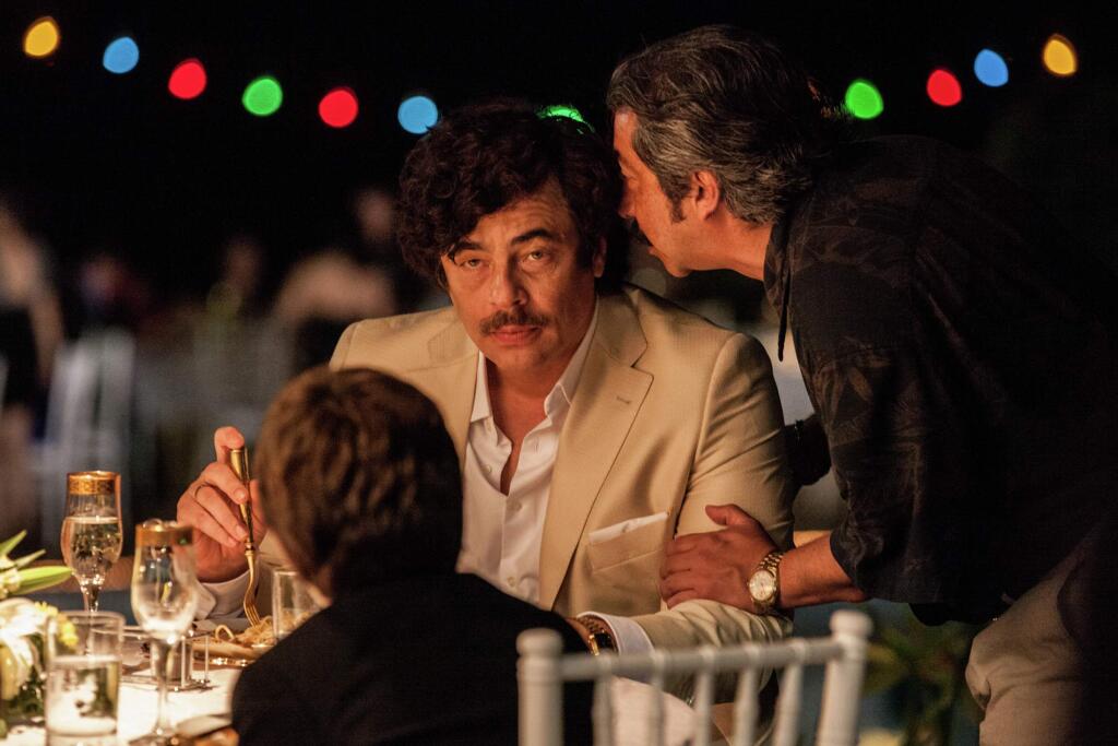 RADiUS-TWCIn 'Escobar: Paradise Lost,' Benicio Del Toro stars as Escobar, the infamous drug lord, and Josh Hutcherson as Nick, a young surfer tasked with committing a murder for Escobar.