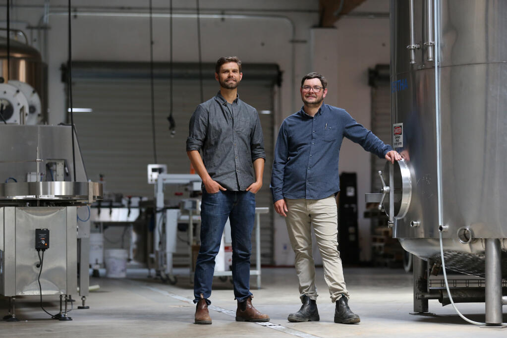Brothers Ryan, left, and Adam Johnston, owners of Biotic Ferments at their production facility in Petaluma, Calif. on Wednesday, June 22, 2022. (Beth Schlanker/The Press Democrat)