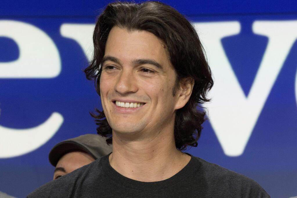 FILE - In this Jan. 16, 2018 file photo, Adam Neumann, co-founder and CEO of WeWork, attends the opening bell ceremony at Nasdaq, in New York. Neumann is stepping aside amid questions about the company's finances. The New York-based office sharing company said Neumann will remain on its board as non-executive chairman. (AP Photo/Mark Lennihan, File)