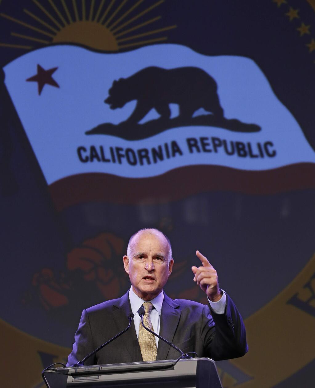 California Gov. Jerry Brown gestures as he speaks at the 91st Annual Sacramento Host Breakfast Wednesday, May 18, 2016, in Sacramento, Calif. (AP Photo/Rich Pedroncelli)