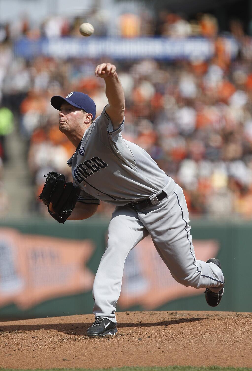 San Diego Padres starting pitcher Robbie Erlin throws against the San Francisco Giants during the first inning of a baseball game in San Francisco, Sunday, Sept. 28, 2014. (AP Photo/Tony Avelar)