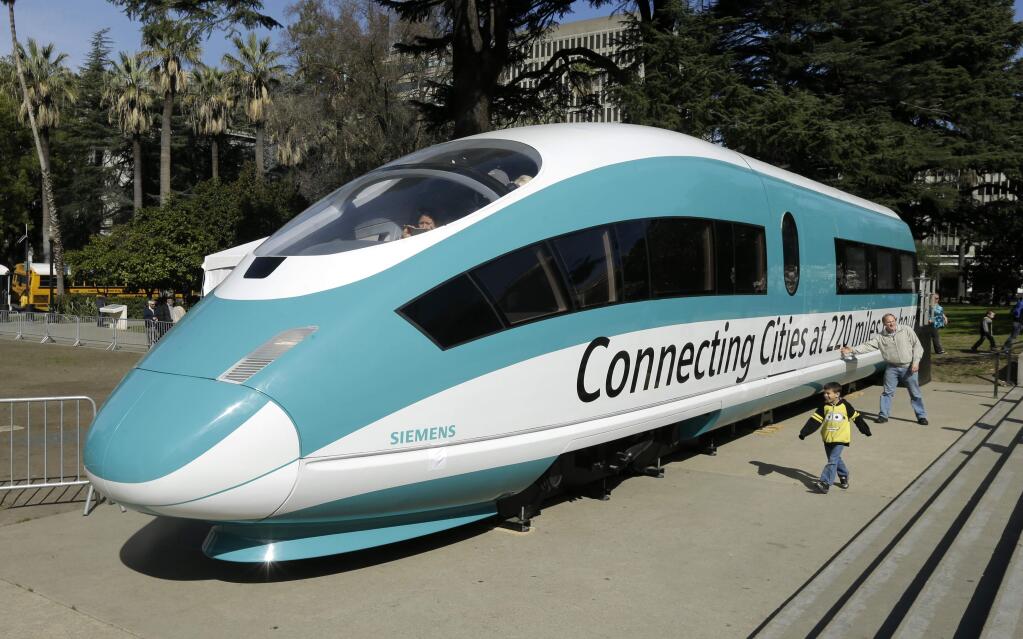 FILE - In this Feb. 26, 2015, photo, a full-scale mock-up of a high-speed train isdisplayed at the Capitol in Sacramento, Calif. The Trump administration cancelled nearly $1 billion in federal money for California's high-speed rail project Thursday, May 16, 2019, further throwing into question the future of the ambitious plan to connect Los Angeles and San Francisco. (AP Photo/Rich Pedroncelli, File)