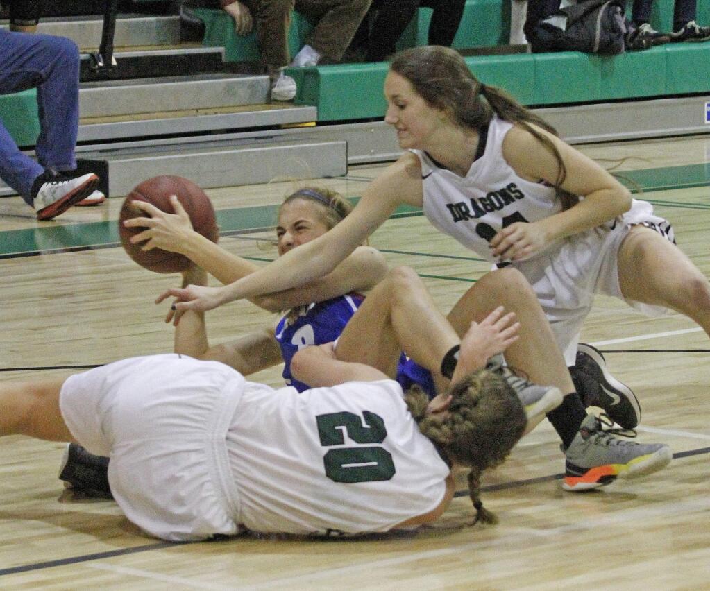 Bill Hoban/Index-TribuneSonoma's Alanna Johnston (20) and Sydney VonGober (14) try to take the ball away from an Analy player in a recent game.