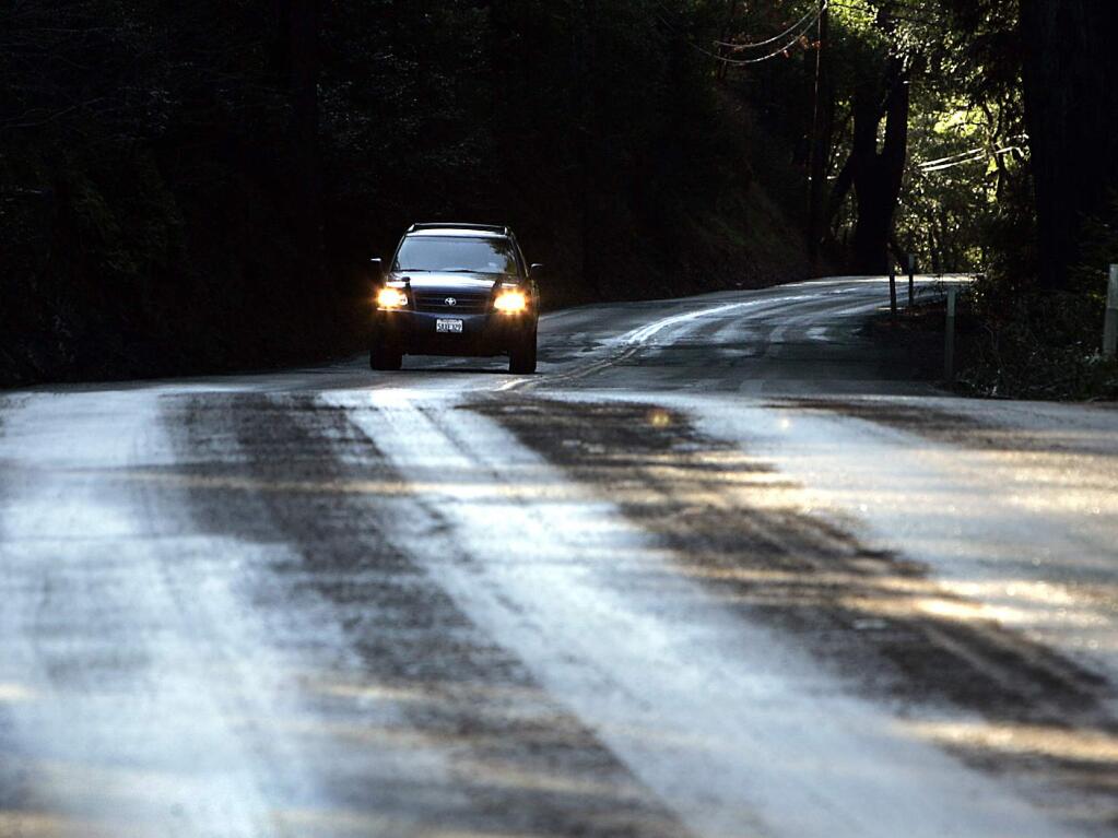 A car drives down an icy stretch of Mark Springs West Road in 2007. (PD FILE)