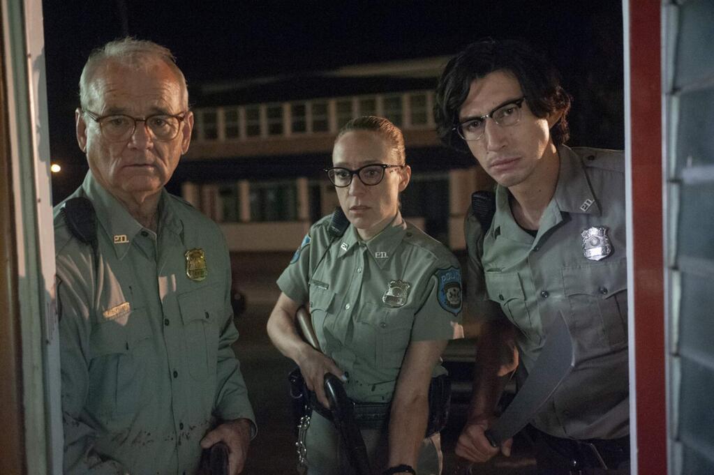 Bill Murray, Chloë Sevigny and Adam Driver as police officers in a pleasant small town that turns to chaos afer a strange solar event and zombie invasion after the arrival of a strange new undertaker in town (Tilda Swinton) in 'The Dead Don't Die,' a comedy from indie director Jim Jarmusch. (Focus Features)