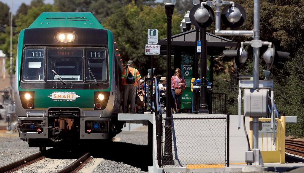 A SMART train makes a stop at the Railroad Square depot in Santa Rosa on Friday, Aug. 17, 2018 in Santa Rosa. (KENT PORTER/ PD)