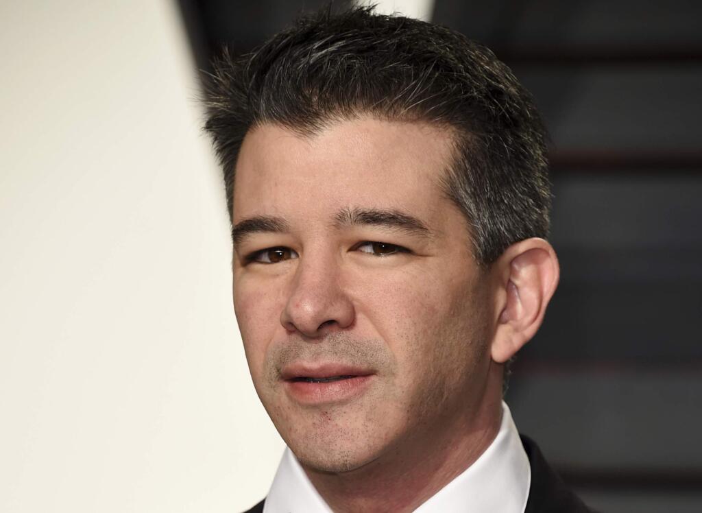FILE - In this Sunday, Feb. 26, 2017, file photo, Uber CEO Travis Kalanick arrives at the Vanity Fair Oscar Party in Beverly Hills, Calif. Kalanick resigned under pressure from investors at a pivotal time for Uber. Uber's board confirmed the move early Wednesday, June 21, saying in a statement that Kalanick is taking time to heal from the death of his mother in a boating accident 'while giving the company room to fully embrace this new chapter in Uber's history.' (Photo by Evan Agostini/Invision/AP, File)