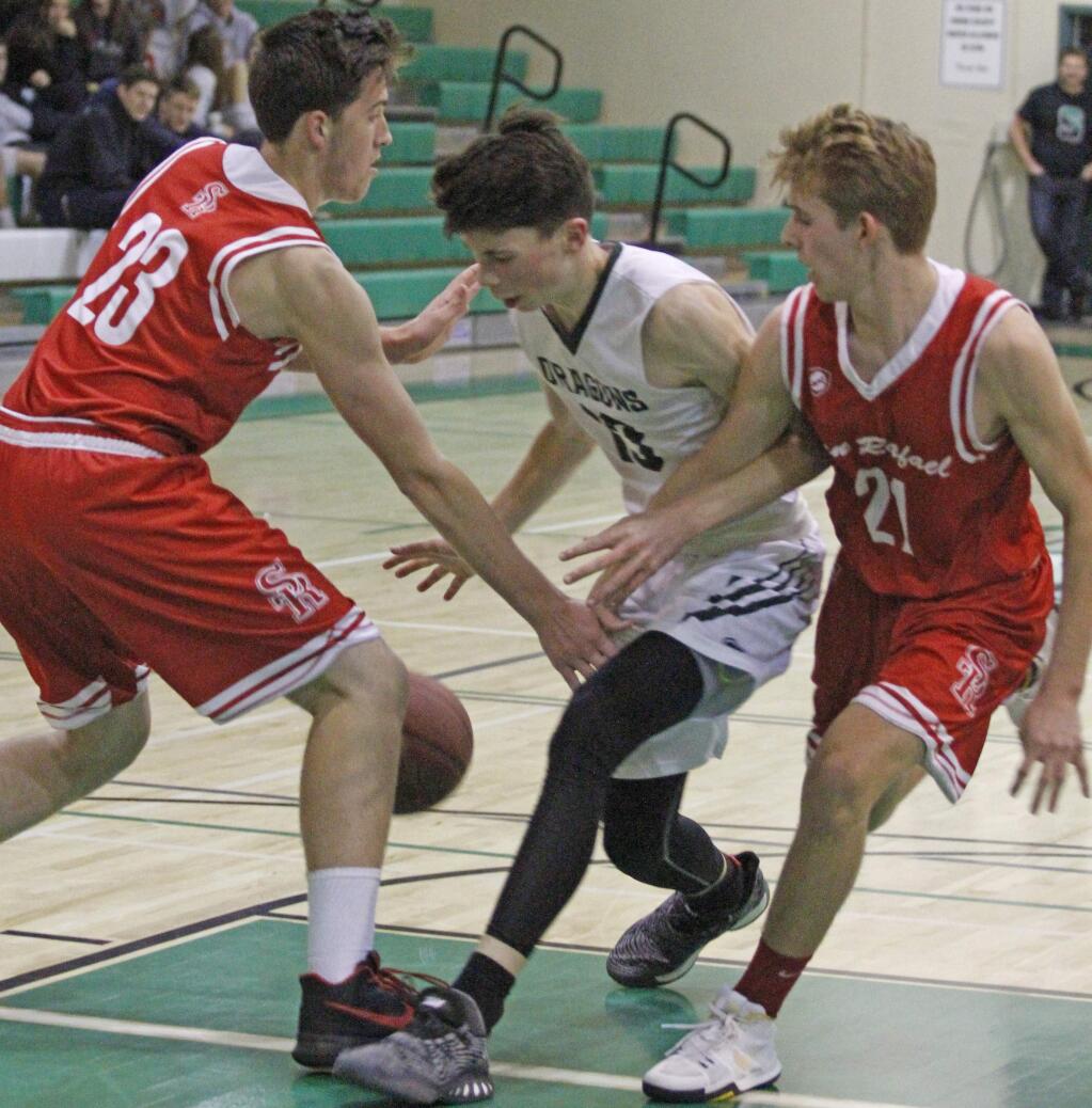 Bill Hoban/Index-TribuneSonoma's Jack Boydell finds himself boxed in during a recent game against San Rafael. Tuesday, Boydell scored 24 points as the Dragons beat Terra Linda. Sonoma hosts Ygnacio Valley Saturday.
