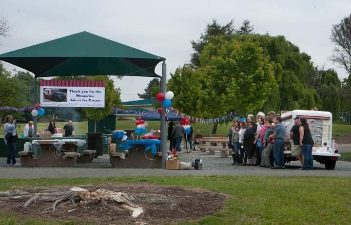 A group photo at the start of the celebration of John's Seratt's farewell party at Petaluma's Lucchesi Park on Saturday, May 23, 2015. (JOHNO'HARA/FOR THE ARGUS-COURIER)