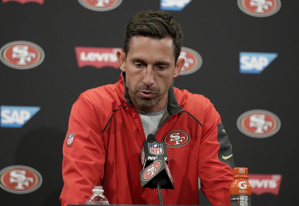 FILE - In this Oct. 22, 2017, file photo, San Francisco 49ers head coach Kyle Shanahan speaks at a news conference after a 40-10 loss to the Dallas Cowboys in an NFL football game, in Santa Clara, Calif. The 49ers are still searching for their first wiin under coach Shanahan. (AP Photo/Marcio Jose Sanchez, File)