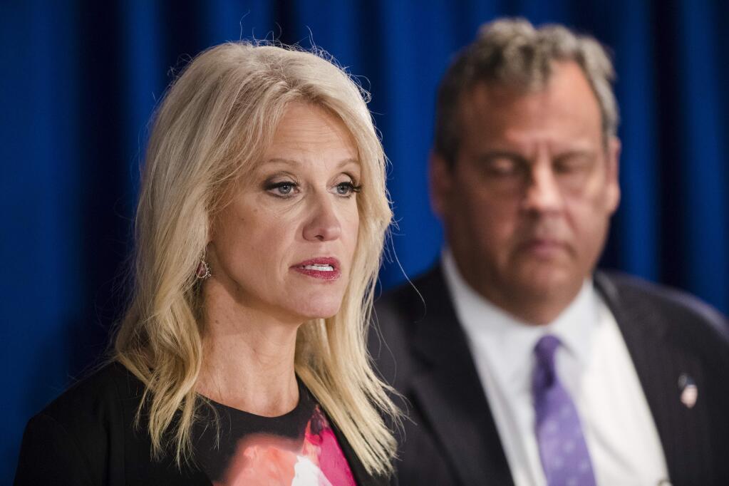 FILE- This is a Monday, Sept. 18, 2017 file photo of Counselor to the President Kellyanne Conway accompanied by New Jersey Gov. Chris Christie as she speaks during a news conference in Trenton, N.J. German linguists Tuesday Jan. 16, 2018 declared the phrase 'alternative facts' _ popularized by White House aide Kellyanne Conway _ the non-word of 2017. Conway used the phrase last year when asked why President Donald Trump's then-Press Secretary Sean Spicer mischaracterized the size of the inauguration crowd. (AP Photo/Matt Rourke, File)