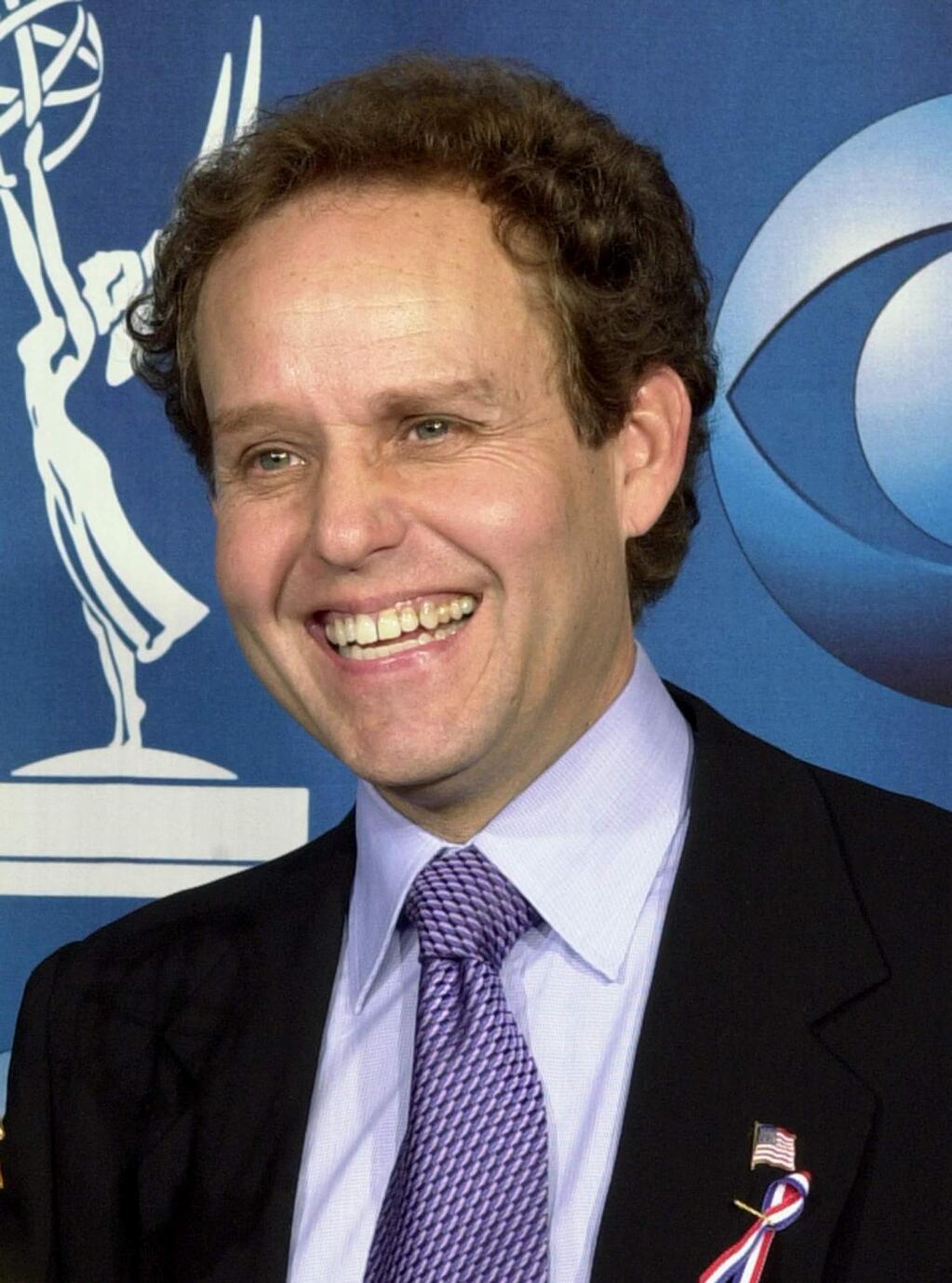 FILE - In this Nov. 4, 2001, file photo, actor Peter MacNicol smiles at the 53rd annual Primetime Emmy Awards at the Shubert Theatre in Los Angeles. MacNicol has been disqualified for an Emmy nomination as a guest for his work in season 5 of 'Veep' because he appeared in two many episodes of the HBO comedy. (AP Photo/Reed Saxon, File)
