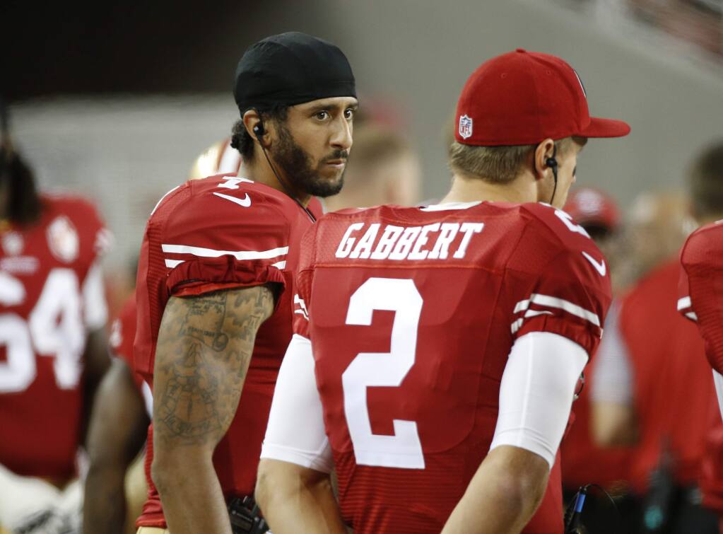 San Francisco 49ers quarterbacks Colin Kaepernick, left, and Blaine Gabbert stand on the sideline during the second half against the Green Bay Packers on Friday, Aug. 26, 2016, in Santa Clara. Green Bay won 21-10. (AP Photo/Tony Avelar)
