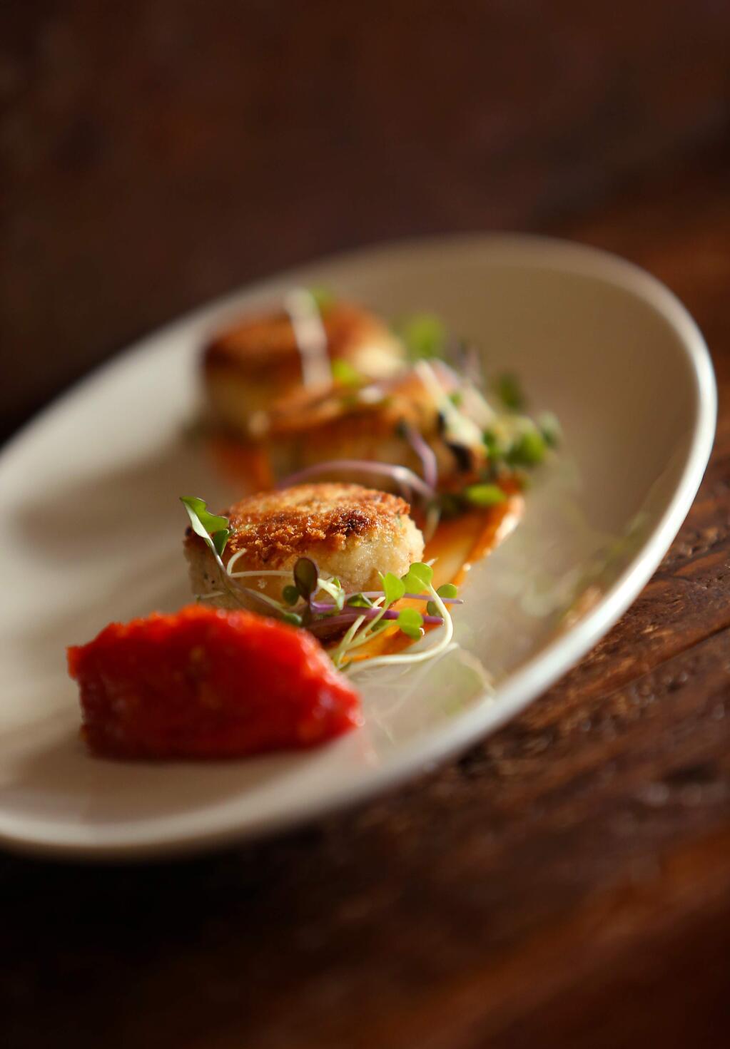 Crab cakes with tomato ginger chutney by The Duck Club executive chef Jeff Reilly.(Christopher Chung/ The Press Democrat)