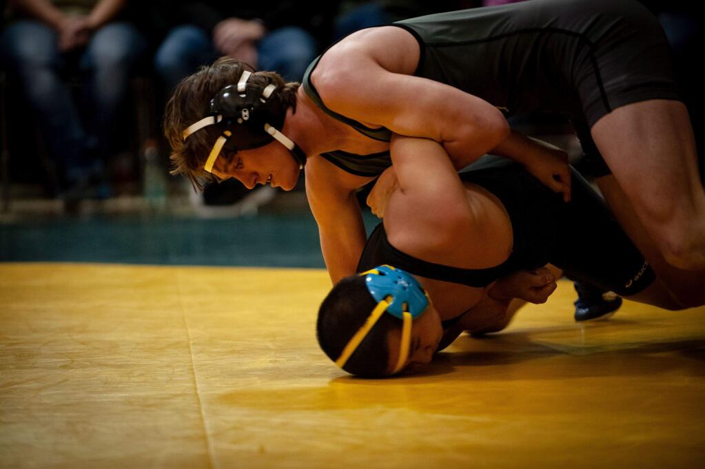 ANDREW GOTSHALL/FOR THE ARGUS-COURIERJack McGuire helped the Casa Grande wrestling team dominate American Canyon by winning a 14-6 major decision.